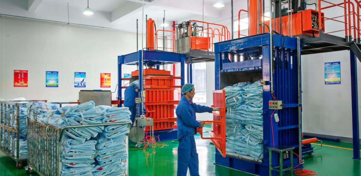 Chinese factory workers creating polyethylene bulk bags
